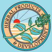 The logo for Herbal Products & Development -red sun rising over way sand shaped in long cylindrical shapes set inside a double circle with Herbal Products & Development in between the circ;les on a golden orange background. Green flower with green leaves and a green stem is placed over the logo.